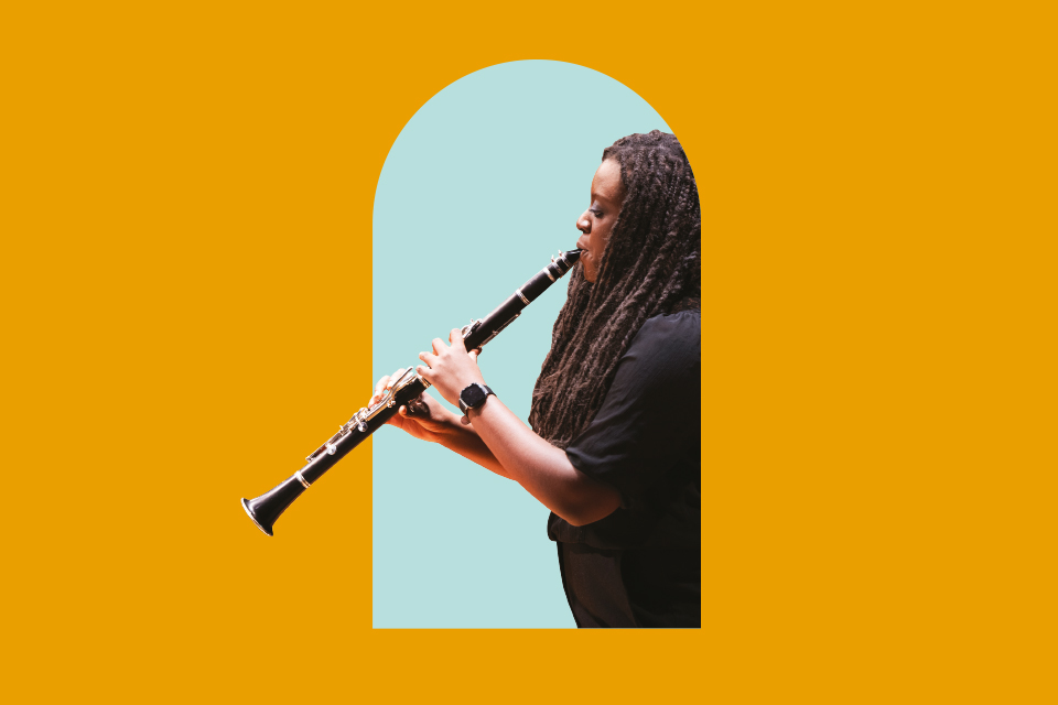 Black female student playing the clarinet to the side, with egg blue arch, with an orange background.